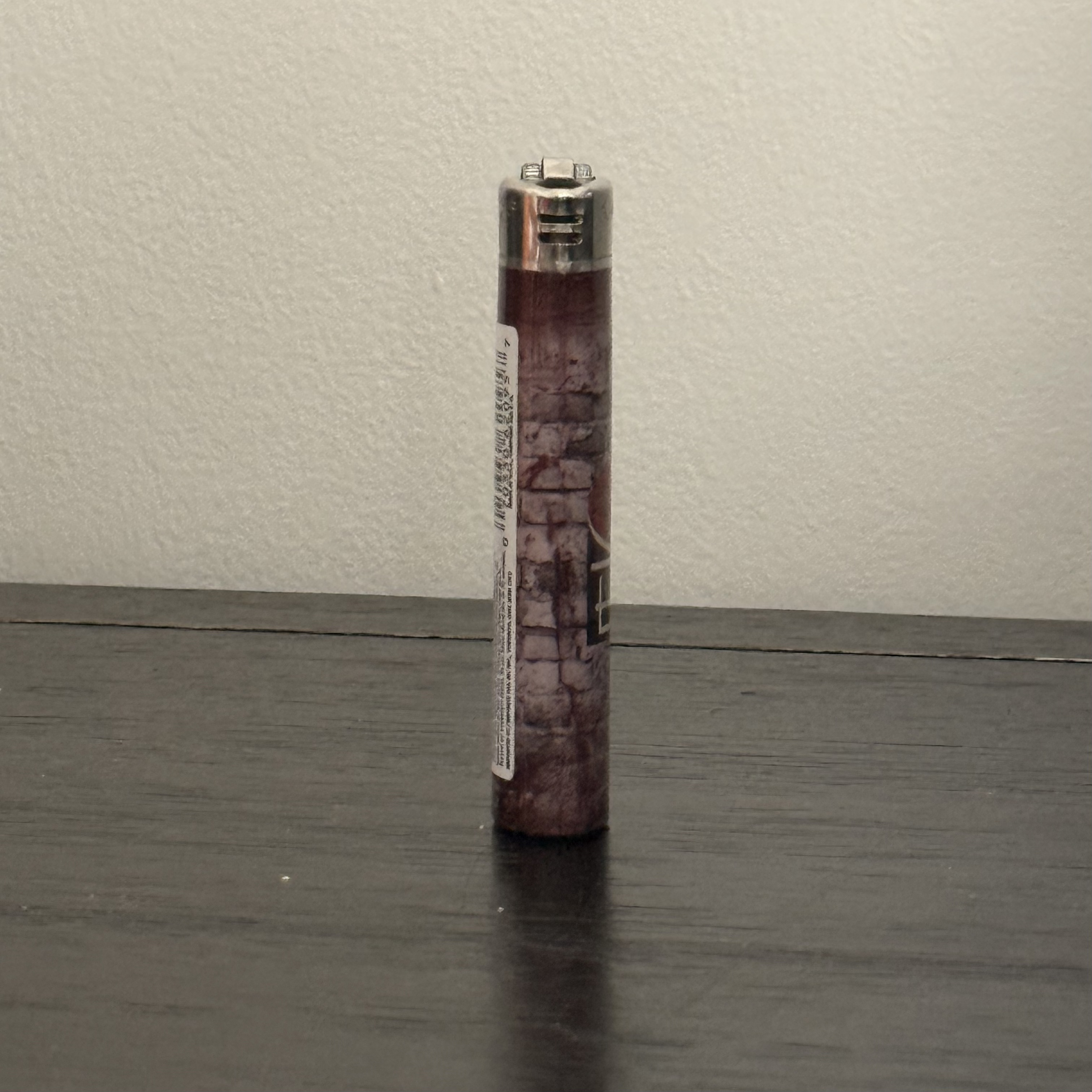This is a photo I took of the most common lighter in Canada from another angle. I chose it because its head is very challenging to make.